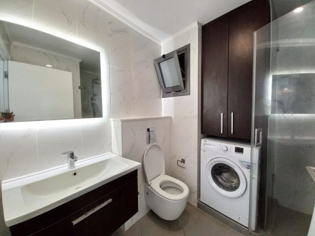 Fully furnished 2+1 flat for rent in a complex with a pool in the center of Kyrenia