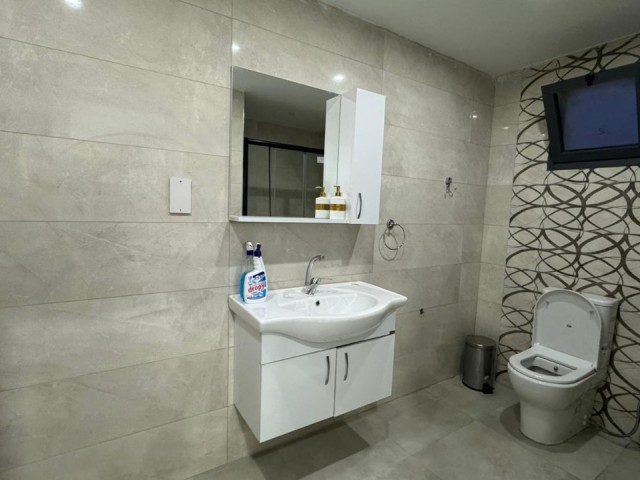 CLEAN AND READY TO MOVE IN 2+1 FLAT WITH COMMUNAL POOL IN ALSANCAK-GIRNE.