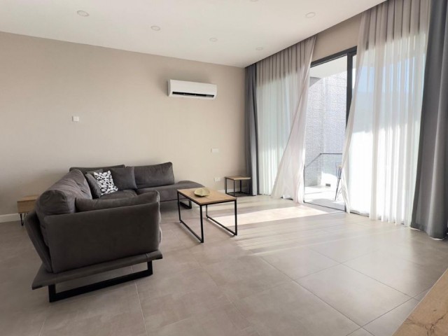 SIMPLE AND MODERN LUXURY 2+1 PENTHOUSE WITH ENSUITE BEDROOMS, 3 WCs, A COMMUNAL POOL AND A SERENE VIEW