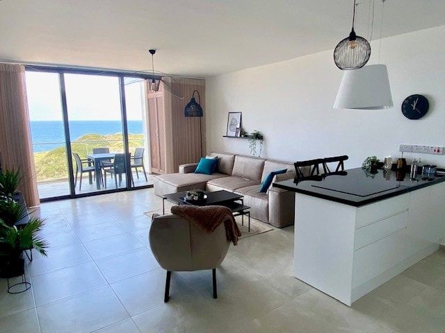 Unique opportunity to own this Seafront gorgeous duplex corner penthouse, with 2 bedrooms & 2 bathrooms  On the sea at Deja blu 2  Eco Wellness Resort. With a strong focus on health  wellness, & great communal facilities including a spa, fitness center, restaurant, bar, beach club, & 2 large pool
