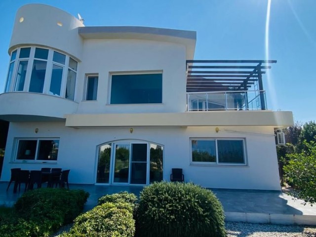 Wow 5 double bedrooms & 5 bathrooms in one very beautifully presented villa, located on the coastline of tatlisu within minutes stroll of the beach. This is a lot of property for your money in an area which is fast developing with prices rising fast. Fantastic rental potential & Investment