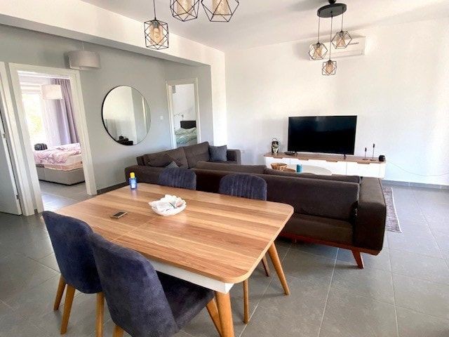 Fantastic opportunity to own a beautiful 3 double bedroom 108M2 spacious Ground Floor apartment on the sought after development, Sea Magic Park. With additional 55 m2 private terraces and garden by the sea in Esentepe. This really is a must view on a great site with an abundance of facilities
