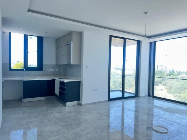 3+1 FLAT FOR SALE IN THE CENTER OF KYRENIA WITH STUNNING MOUNTAIN, SEA AND CITY VIEW