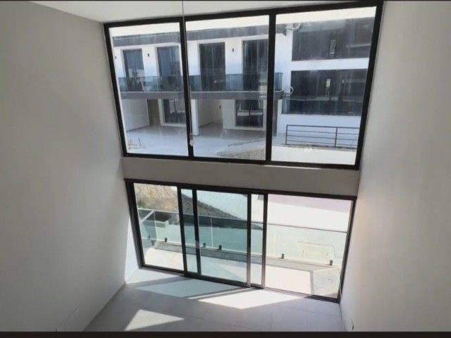 2+1 flats for sale in a site with a shared pool in Alsancak