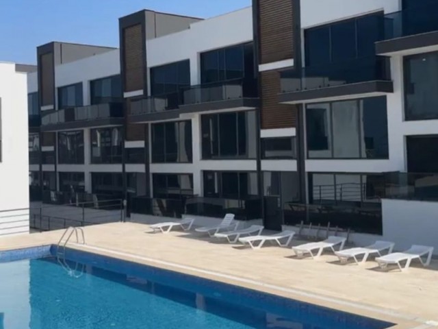 2+1 flats for sale in a site with a shared pool in Alsancak