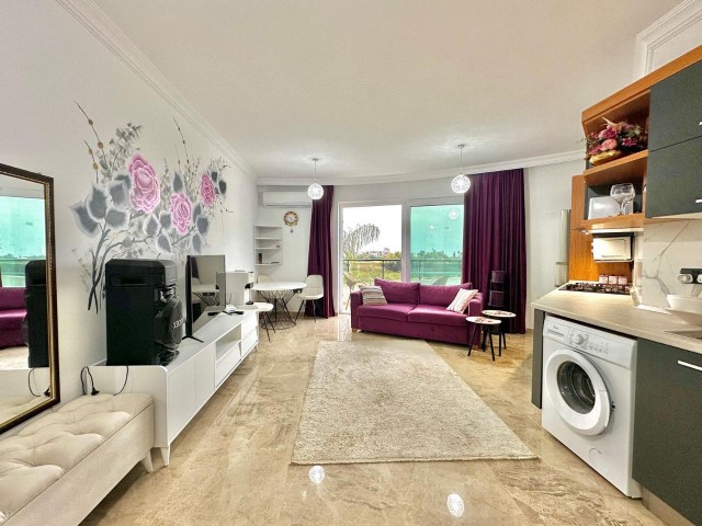 Prime Investment Opportunity: Luxurious 1+1 Apartment with Private Terrace and Resort-Style Amenities in Girne, Karaoglanoglu