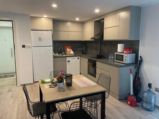 ULTRA LUXURY 1+1 FLAT IN KYRENIA CENTER AKACAN WITH EXTENSIVE FACILITIES SUCH AS SWIMMING POOL AND PARKING PARKING FULL CITY VIEW AND 2 BALCONIES..