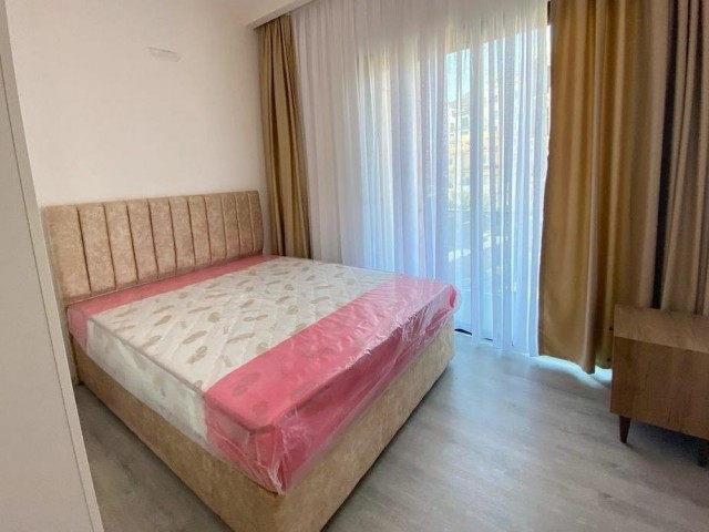 1+1 WOHNUNG ZUM VERKAUF IN KYRENIA CENTRAL ASLANLI VILLA-GEBIET MIT SOZIALEN EINRICHTUNGEN WIE SCHWIMMBAD UND FITNESSRAUM, VOLLSTÄNDIG MÖBLIERT, EINSCHLIESSLICH SPÜLMASCHINE, GERÄUMIG UND GERÄUMIG MIT AUFZUG UND BALKON