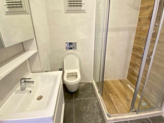 1+1 FLAT FOR SALE IN KYRENIA CENTRAL ASLANLI VILLA AREA WITH SOCIAL FACILITIES SUCH AS SWIMMING POOL AND GYM, FULLY FURNISHED INCLUDING DISHWASHER, SPACIOUS AND SPACIOUS WITH ELEVATOR AND BALCONY