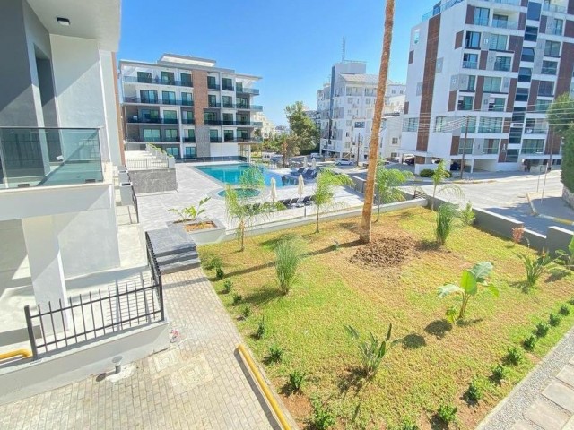 1+1 FLAT FOR SALE IN KYRENIA CENTRAL ASLANLI VILLA AREA WITH SOCIAL FACILITIES SUCH AS SWIMMING POOL AND GYM, FULLY FURNISHED INCLUDING DISHWASHER, SPACIOUS AND SPACIOUS WITH ELEVATOR AND BALCONY