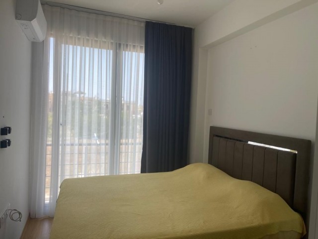 2+1 FULLY FURNISHED FLAT WITH A GREAT VIEW AND ITS OWN PRIVATE TERRACE FOR RENT IN A SITE WITH A SWIMMING POOL, CLOSED PARKING PARKING IN GIRNE DOĞANKÖY AREA.