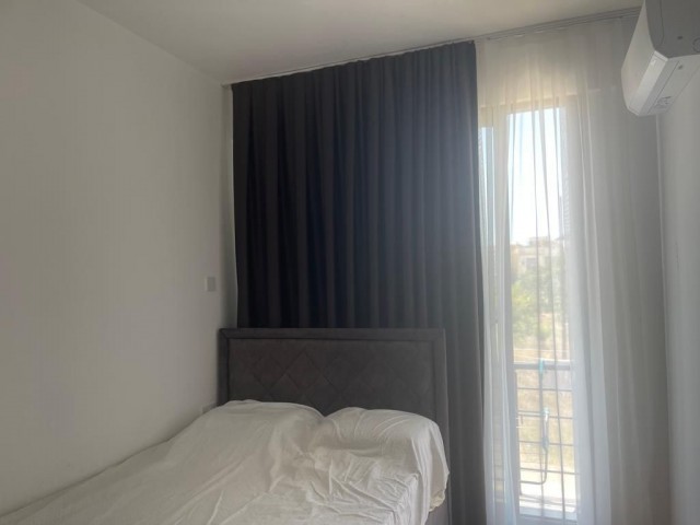 2+1 FULLY FURNISHED FLAT WITH A GREAT VIEW AND ITS OWN PRIVATE TERRACE FOR RENT IN A SITE WITH A SWIMMING POOL, CLOSED PARKING PARKING IN GIRNE DOĞANKÖY AREA.