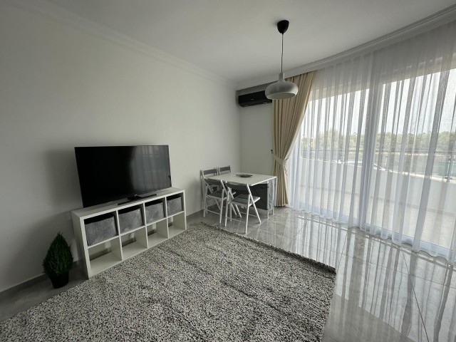 1 + 1 Apartment for Sale on a Site with a Pool in Kyrenia Edremit ** 