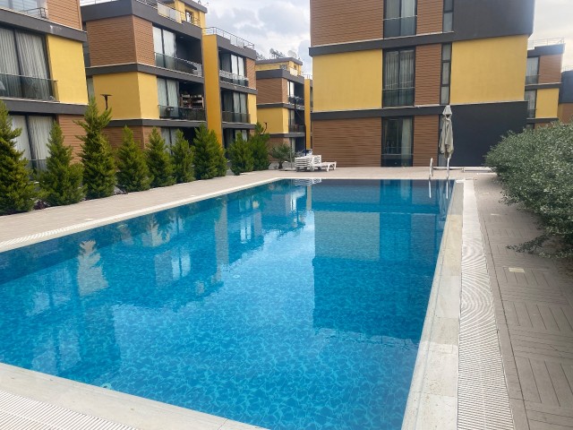 2+1 Apartment for Sale in a Complex with Pool in Alsancak