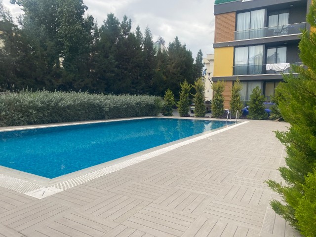 2+1 Apartment for Sale in a Complex with Pool in Alsancak