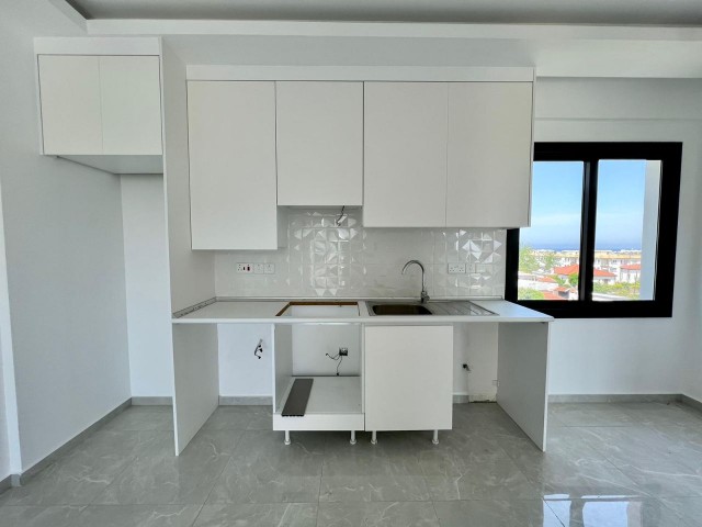 1+1 flat for sale with roof terrace in a site with pool in Alsancak