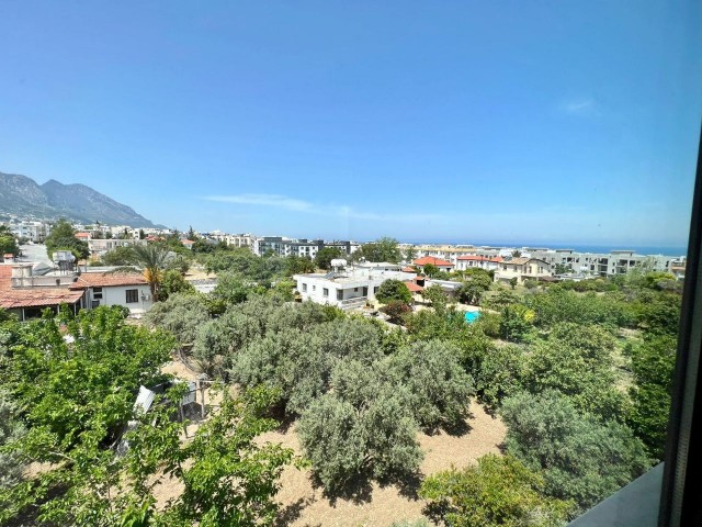 1+1 flat for sale with roof terrace in a site with pool in Alsancak