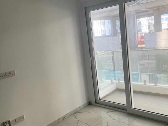 1+1 FLAT FOR SALE IN İSKELE LONG BEACH, 250 METERS FROM THE SEA