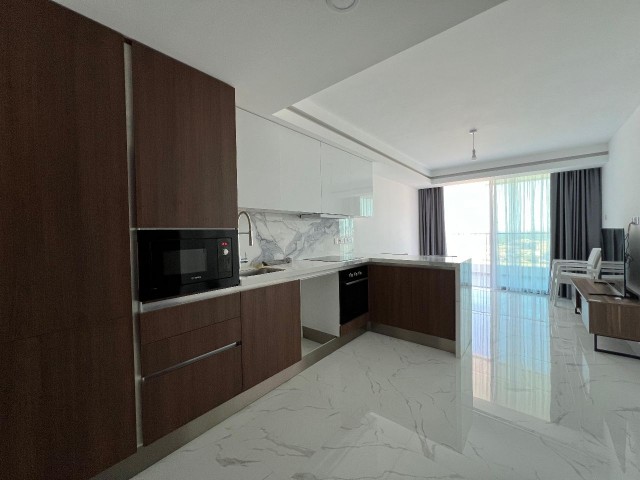 Sale of a finished 1+1 Apartment in Block A Grand Sapphire with views of Famagusta on the 23rd floor