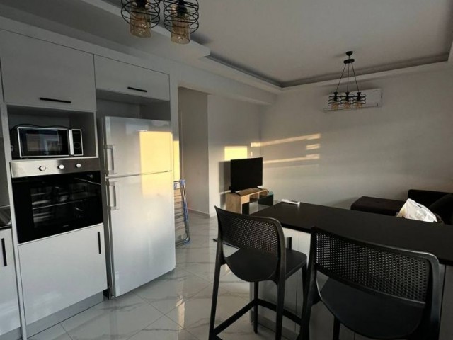 *** 1+1 FLAT FOR RENT WITH SHARED POOL IN ALSANCAK, WALKING DISTANCE TO THE SEA***