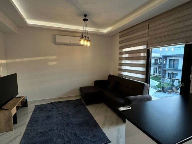 *** 1+1 FLAT FOR RENT WITH SHARED POOL IN ALSANCAK, WALKING DISTANCE TO THE SEA***