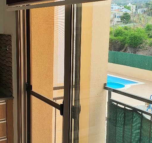 ***FULLY FURNISHED 2+1 FLAT FOR SALE IN A SITE WITH POOL IN LAPTA WITH A STUNNING VIEW***