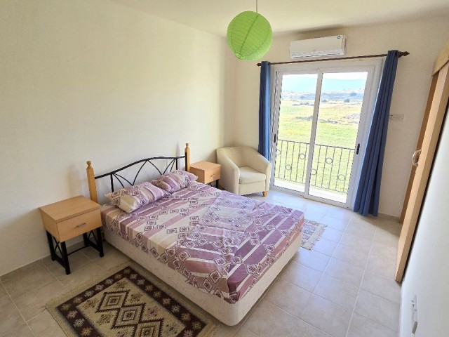 FURNISHED 2 BED, 2 BATH SECOND FLOOR APARTMENT WITH BEAUTIFUL SEA VIEW