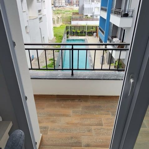 In İskele Long Beach Area 1+1 Flat For Rent (with a pool) From 400$ Yearly Payment + 400 $ Deposit +