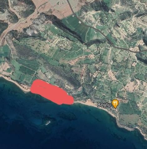 40762,97 m2 land for sale in Kaleburn, Iskele, by the sea, with tourism development