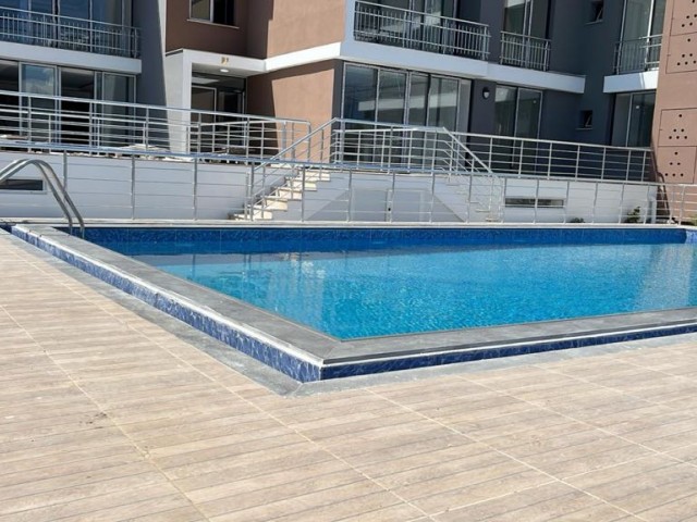 2+1 LUXURY FLATS WITH POOL AND MAGNIFICENT ARCHITECTURE WITHIN THE SITE IN ALSANCAK