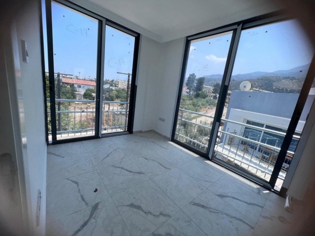 2+1 LUXURY FLATS WITH POOL AND MAGNIFICENT ARCHITECTURE WITHIN THE SITE IN ALSANCAK