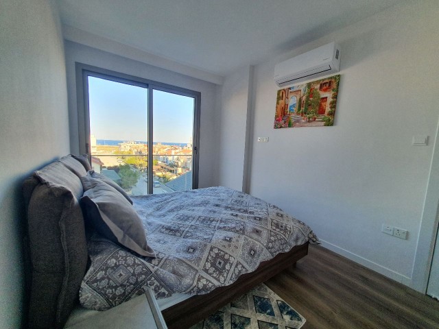 Iskele, Long Beach'te  deniz manzaralı full eşyalı kiralık 1+1 daire