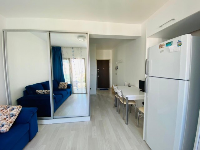 STUDIOWOHNUNG MIT POOL ZUR TÄGLICHEN MIETE IN GIRNE KARAOĞLANOĞLU