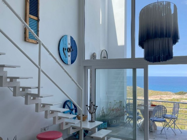 Affordable penthouse apartment overlooking the sea