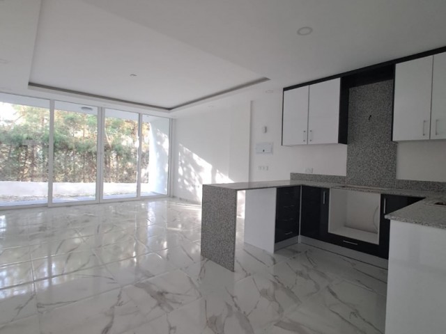 1+1 flat for sale in Doğankoy with sea and mountain views