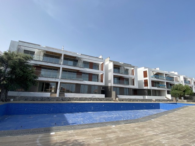 2+1 flat for sale in a site with shared pool in Alsancak, Necat British area