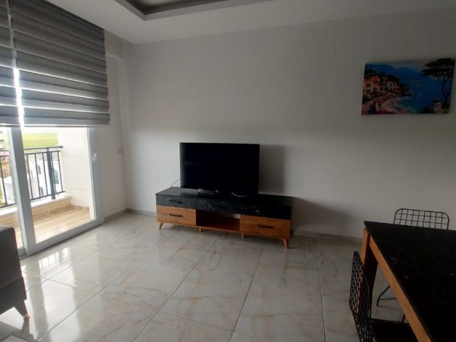 2+1 FLAT FOR SALE IN İSKELE LONG BEACH IN A QUIET AREA WITH MOUNTAIN AND SEA VIEW