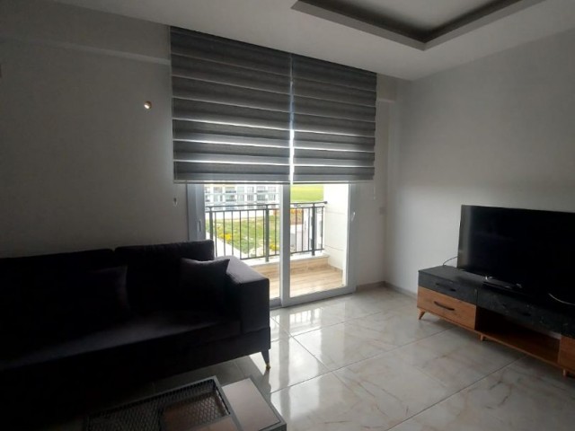 2+1 FLAT FOR SALE IN İSKELE LONG BEACH IN A QUIET AREA WITH MOUNTAIN AND SEA VIEW