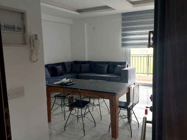 2+1 FLAT FOR SALE IN İSKELE LONG BEACH IN A QUIET AREA WITH MOUNTAIN AND SEA VIEW