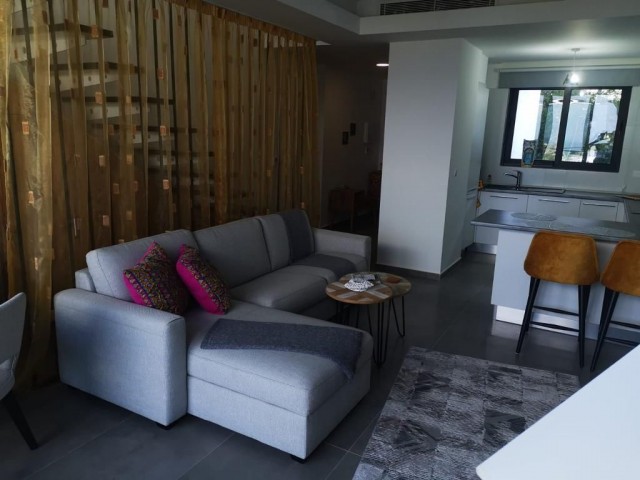 2+1 FLAT WITH MOUNTAIN AND SEA VIEWS FOR SALE IN ESENTEPE SUN VALLEY..