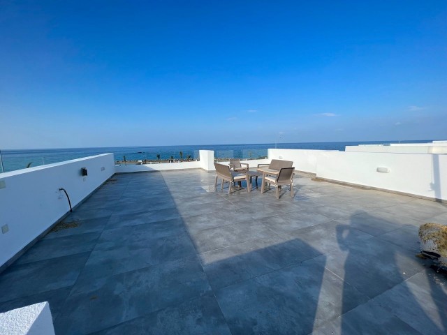 Sea front superb 2 bedroom apartment with panoramic roof top terrace
