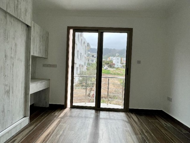 2+1 flat for sale in a newly built site in Alsancak Center 108.000 STG / +90 542 884 2944
