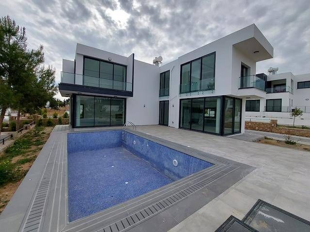 New Modern 3+1 Luxury Villa For Sale In The Peaceful Area Of Çatalköy With Sea View, Private Swimmin