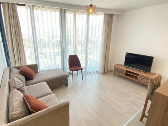  Girne Karakum'da rezidansta deniz ve dağ manzaralı full eşyalı 1+1 kiralık daire