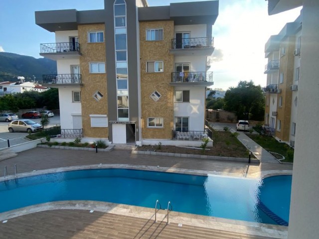 2+1 UNFURNISHED LOFT FLAT IN ALSANCAK WITH SHARED POOL