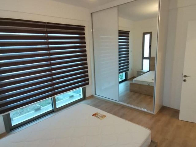 FOR RENT 2+1 APARTMENT ON GROUND FLOOR  IN ALSANCAK / CLOSE TO SHOCK MARKET AND "CAMELOT" BEACH