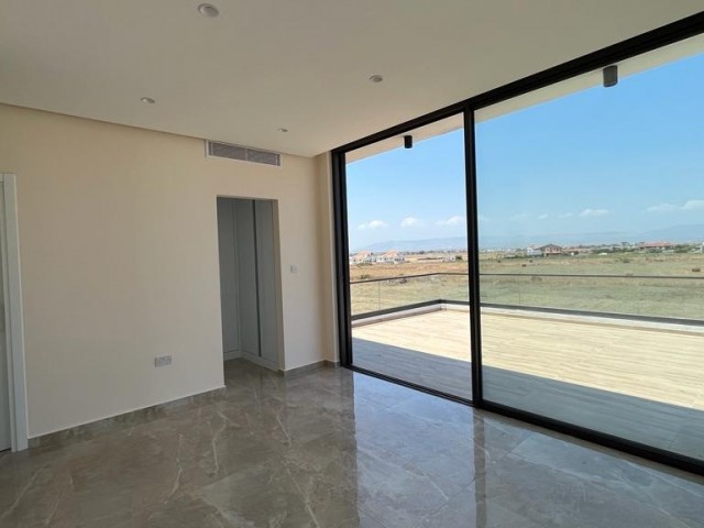 Modern style large and beautiful 4+1 villa in Yeniboğaziçi region just 3 minutes away from natural sandy beach Long Beach