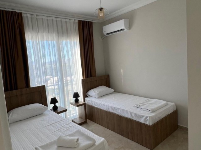 DAILY RENTAL FLATS IN A SAFE SITE WITH HABUZLU IN İSKELE LONG BEACH AREA