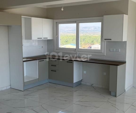 1+1 FLAT FOR SALE in İskele Bahçeler with mountain and sea view and shared pool