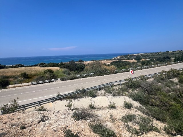 13 DECLARES OF LAND FOR SALE IN İSKELE/KAPLICA WITH THE MAIN ROAD OPEN FOR CONSTRUCTION, WHICH HAS MOUNTAIN AND SEA VIEWS.. 0533 859 21 66